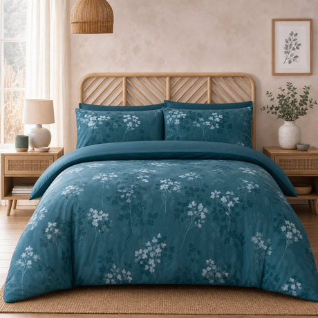 Flynn Eco Floral Teal Polycotton Duvet Cover Set styled on a bed in a coordinated bedroom lifestyle scene