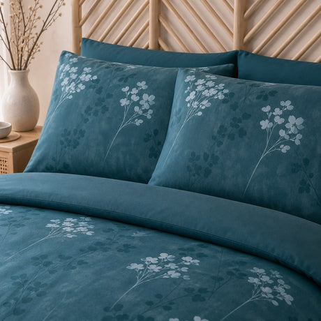 Close-up of matching Flynn Eco Floral Teal Polycotton Duvet Cover Set pillowcases showing the pattern and fabric detail
