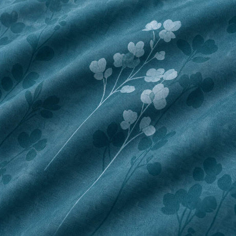 Macro close-up of the polycotton fabric on the Flynn Eco Floral Teal Polycotton Duvet Cover Set