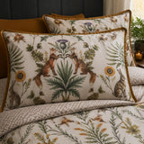 Close-up of Foxdale brushed cotton pillowcases showing fox hare thistle and sunflower woodland print