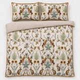 Overhead flat lay of the Foxdale woodland brushed cotton duvet cover set with two pillows