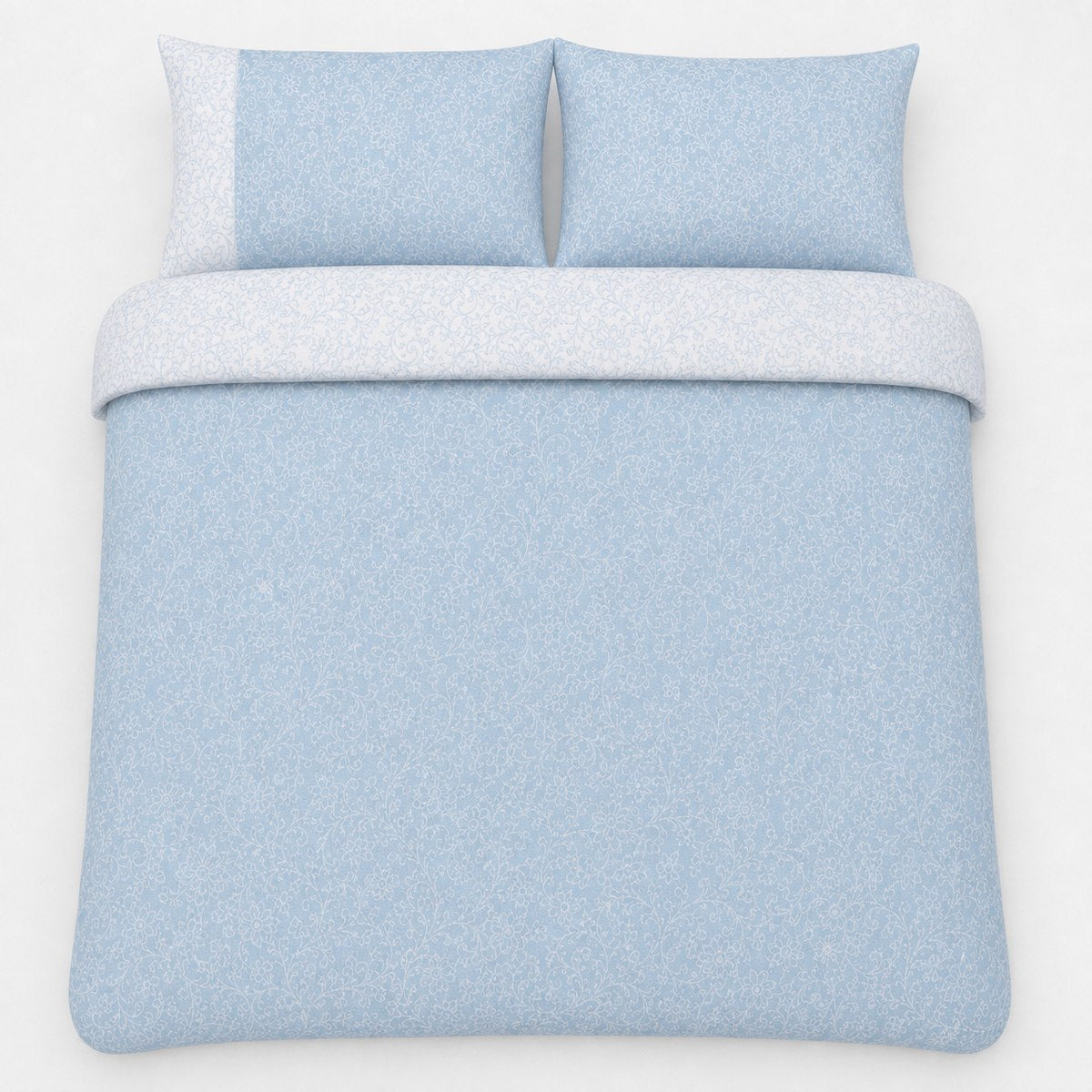 Overhead flat lay of the Frampton Floral Polycotton Duvet Cover Set in blue with two matching pillowcases