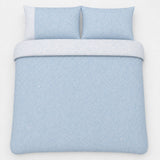 Overhead flat lay of the Frampton Floral Polycotton Duvet Cover Set in blue with two matching pillowcases