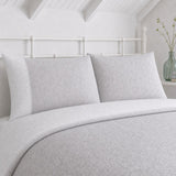 Close-up of Frampton Floral Polycotton Duvet Cover Set in grey pillowcases showing the print and fabric detail