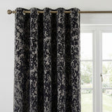 Close-up of the black Galaxy room darkening eyelet curtain showing the textured fabric and eyelet heading