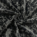Macro detail of the black Galaxy room darkening curtain fabric texture