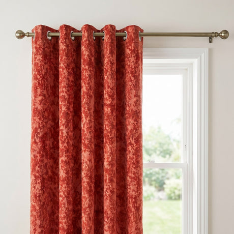 Close-up of the copper Galaxy room darkening eyelet curtain showing the textured fabric and eyelet heading