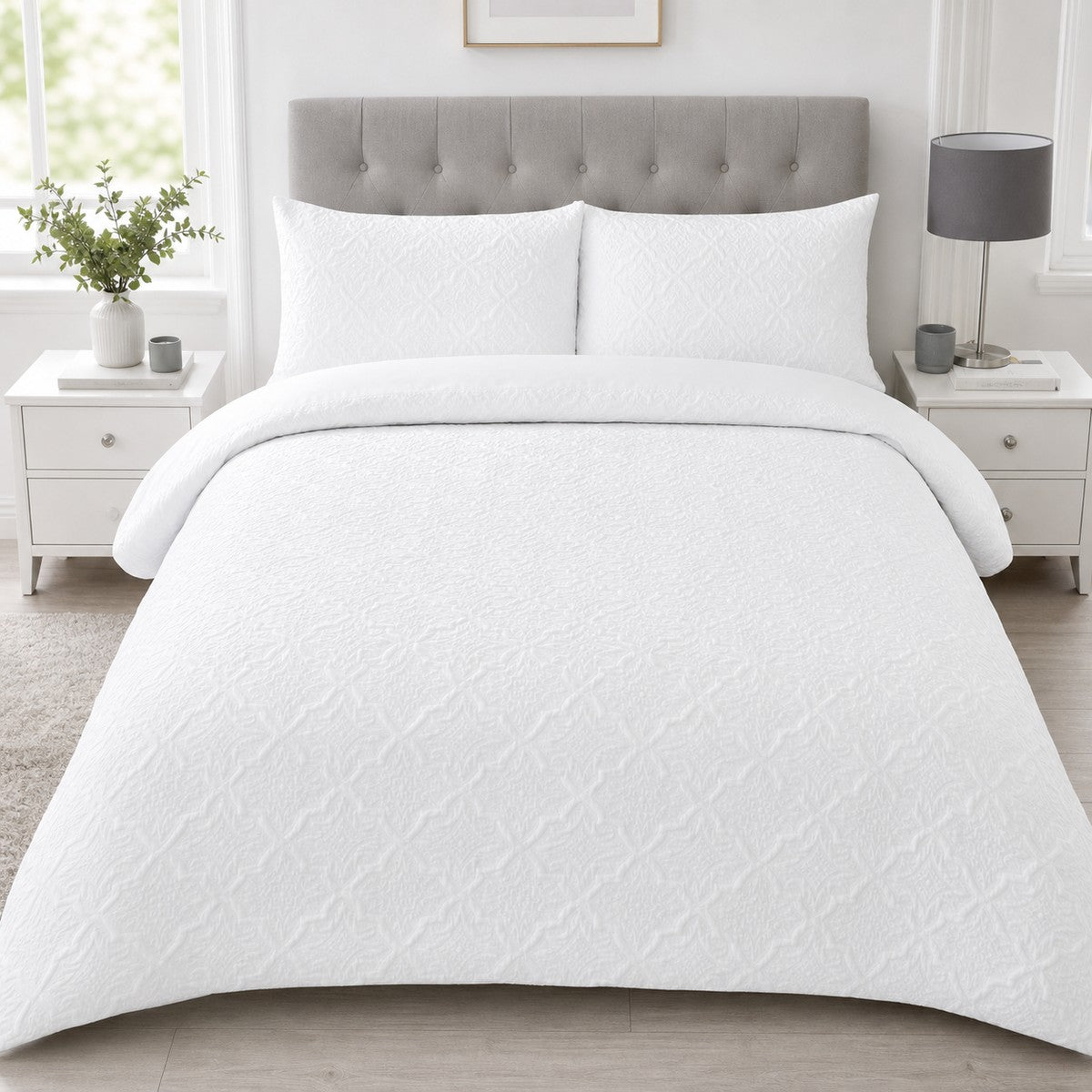 Gianna Microfibre Duvet Cover Set styled on a bed in a coordinated bedroom lifestyle scene