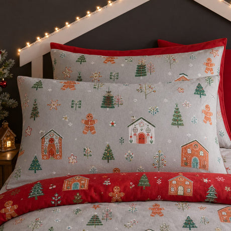 Close-up of matching Gingerbread House Christmas Polycotton Duvet Cover Set pillowcases showing the pattern and fabric detail