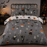 Halloween Party Polycotton Duvet Cover Set styled on a bed in a coordinated bedroom lifestyle scene