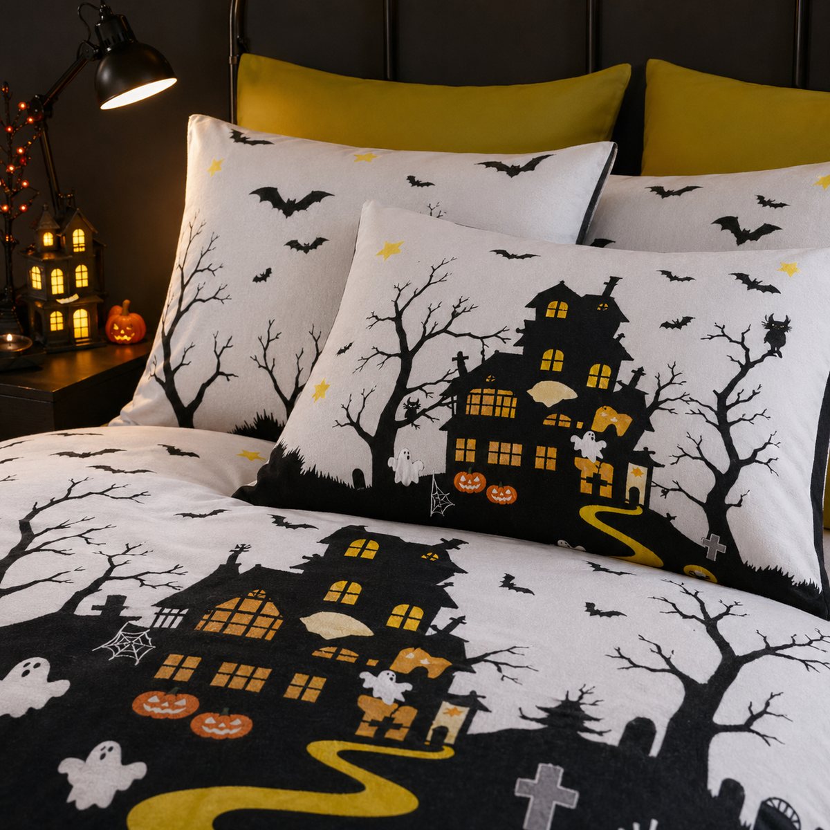 Close-up of matching Haunted House Halloween Polycotton Duvet Cover Set pillowcases showing the pattern and fabric detail