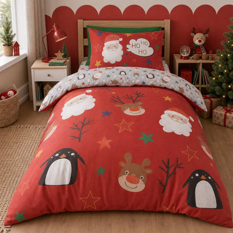 Ho Ho Ho Christmas Duvet Cover Set Red Polycotton styled on a bed in a coordinated bedroom lifestyle scene