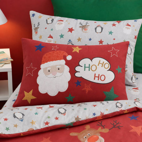 Close-up of matching Ho Ho Ho Christmas Duvet Cover Set Red Polycotton pillowcases showing the pattern and fabric detail