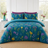 Ingrid Polycotton Duvet Cover Set in teal styled on a coordinated bedroom bed