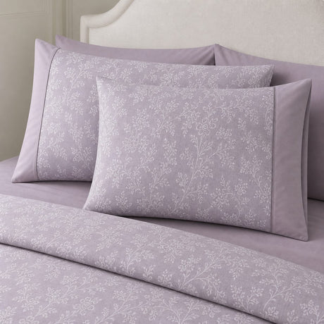 Close-up of Jasmine lavender floral woven polycotton pillowcases showing the soft white vine pattern