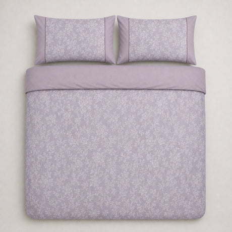 Overhead flat lay of the Jasmine lavender floral duvet cover set with two matching pillowcases