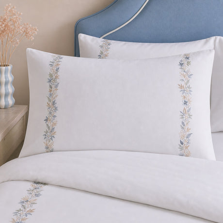Close-up of Julianna Embroidered 100% Cotton Duvet Cover Set in white pillowcases showing the print and fabric detail