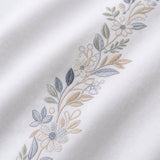 Macro close-up of the white fabric on the Julianna Embroidered 100% Cotton Duvet Cover Set