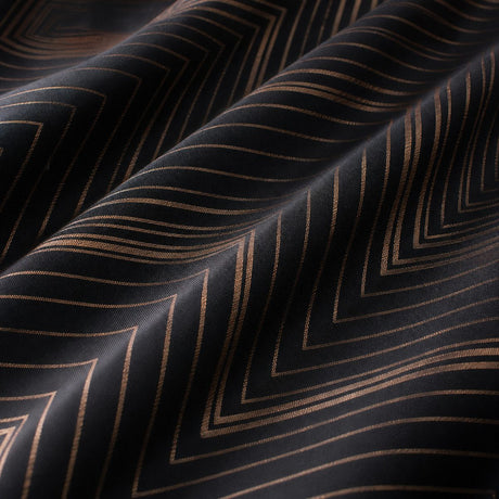 Macro close-up of the black fabric on the Laurence Llewelyn-Bowen Cocktail Microfibre Duvet Cover Set