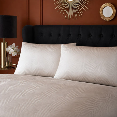 Close-up of Laurence Llewelyn-Bowen Cocktail Microfibre Duvet Cover Set in ivory pillowcases showing the print and fabric detail