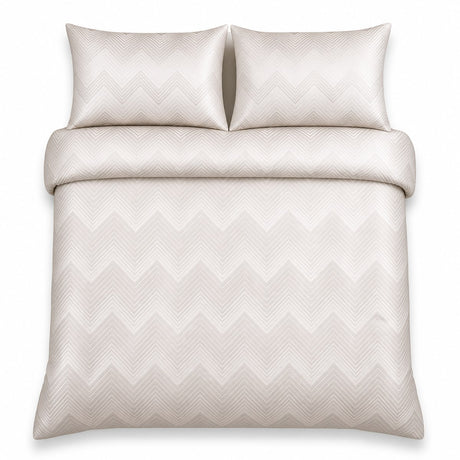Overhead flat lay of the Laurence Llewelyn-Bowen Cocktail Microfibre Duvet Cover Set in ivory with two matching pillowcases