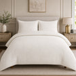 Laurence Llewelyn-Bowen Emile Microfibre Duvet Cover Set in cream styled on a coordinated bedroom bed