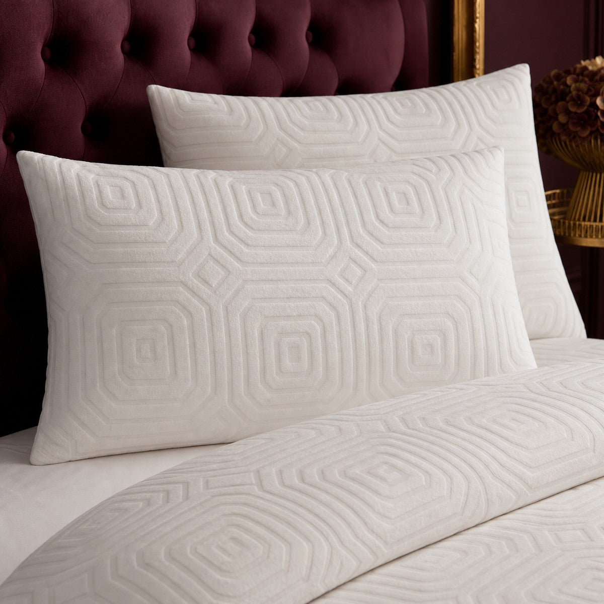 Close-up of Laurence Llewelyn-Bowen Emile Microfibre Duvet Cover Set in cream pillowcases showing the print and fabric detail