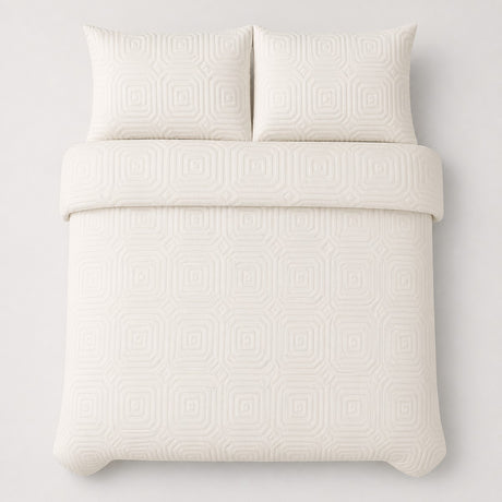 Overhead flat lay of the Laurence Llewelyn-Bowen Emile Microfibre Duvet Cover Set in cream with two matching pillowcases