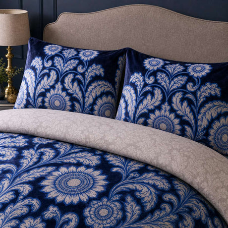 Close-up of matching Laurence Llewelyn-Bowen Romilly Velvet Floral Duvet Cover Set pillowcases showing the pattern and fabric detail