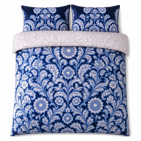 Overhead flat lay of the Laurence Llewelyn-Bowen Romilly Velvet Floral Duvet Cover Set with two matching pillowcases
