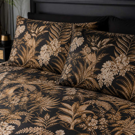 Close-up of matching Laurence Llewelyn-Bowen Suburban Jungle Cotton Duvet Cover Set pillowcases showing the pattern and fabric detail