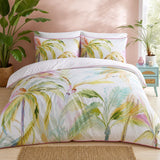 Leilani Cotton Duvet Cover Set in green styled on a coordinated bedroom bed