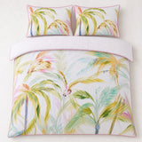 Overhead flat lay of the Leilani Cotton Duvet Cover Set in green with two matching pillowcases