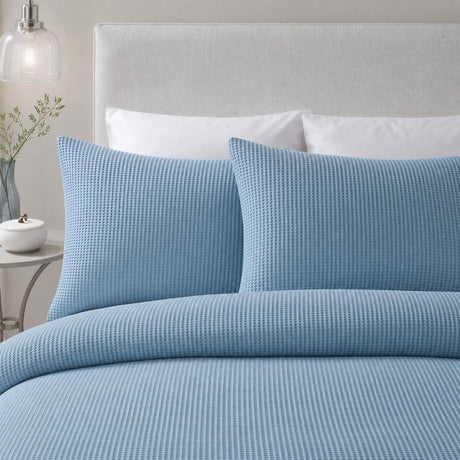 Close-up of Lindly Waffle Microfibre Duvet Cover Set in blue pillowcases showing the print and fabric detail