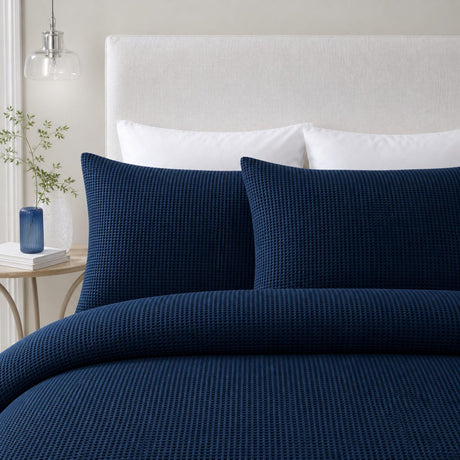 Close-up of Lindly Waffle Microfibre Duvet Cover Set in navy pillowcases showing the print and fabric detail