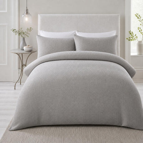 Lindly Waffle Microfibre Duvet Cover Set in silver styled on a coordinated bedroom bed