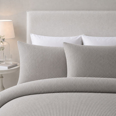 Close-up of Lindly Waffle Microfibre Duvet Cover Set in silver pillowcases showing the print and fabric detail