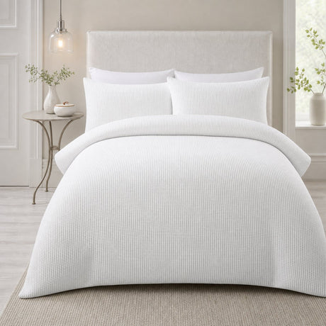 Lindly Waffle Microfibre Duvet Cover Set in white styled on a coordinated bedroom bed