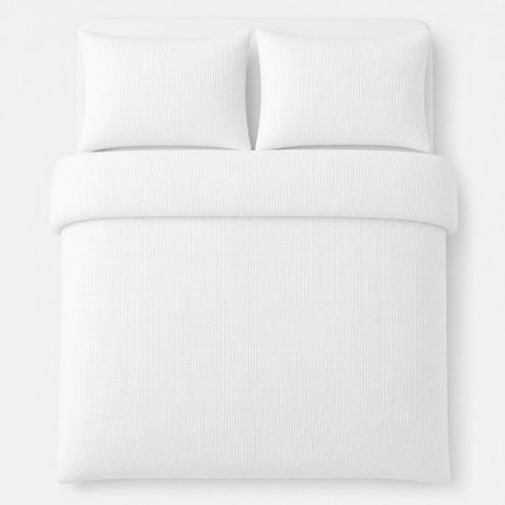 Overhead flat lay of the Lindly Waffle Microfibre Duvet Cover Set in white with two matching pillowcases