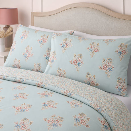 Close-up of matching Lorena Patchwork Floral Duck Egg Polycotton Duvet Cover Set pillowcases showing the pattern and fabric detail