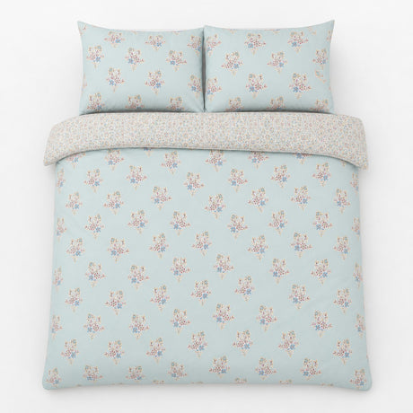 Overhead flat lay of the Lorena Patchwork Floral Duck Egg Polycotton Duvet Cover Set with two matching pillowcases