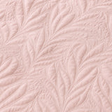 Macro close-up of the blush pink Luana soft microfibre leaf stitch fabric