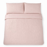 Overhead flat lay of the Luana Blush duvet cover set with two matching pillowcases