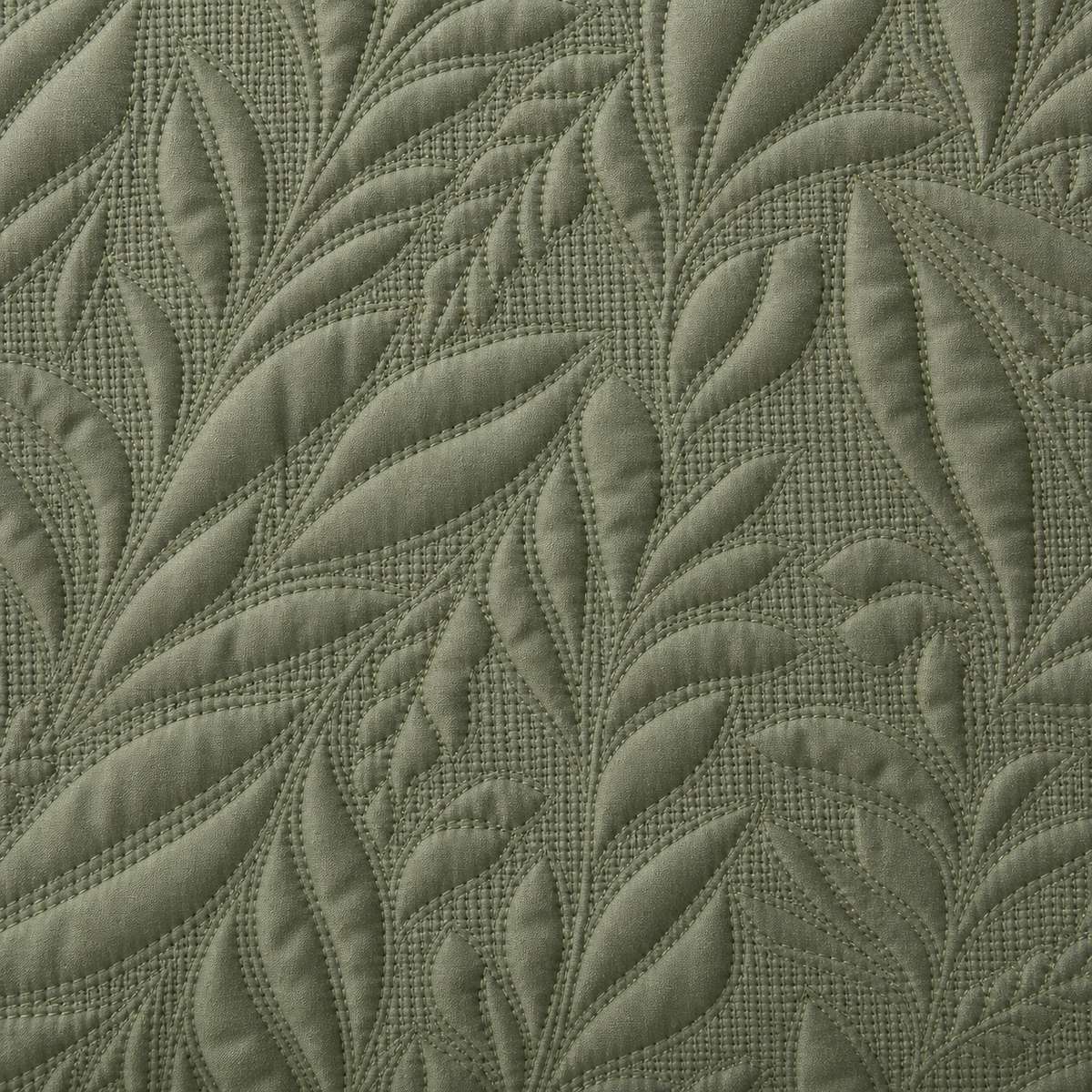 Macro close-up of the dark olive green Luana soft microfibre leaf stitch fabric
