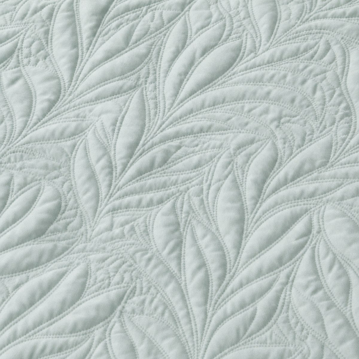 Macro close-up of the pale green Luana soft microfibre leaf stitch fabric