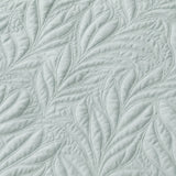 Macro close-up of the pale green Luana soft microfibre leaf stitch fabric