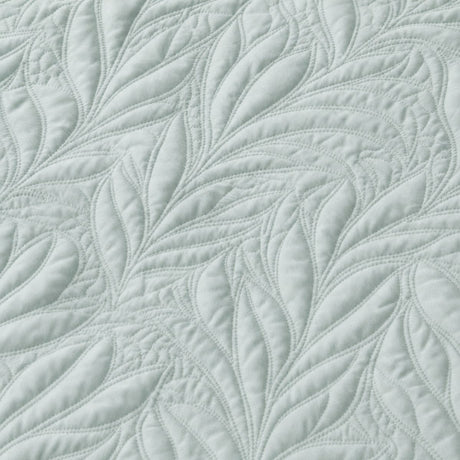 Macro close-up of the pale green Luana soft microfibre leaf stitch fabric