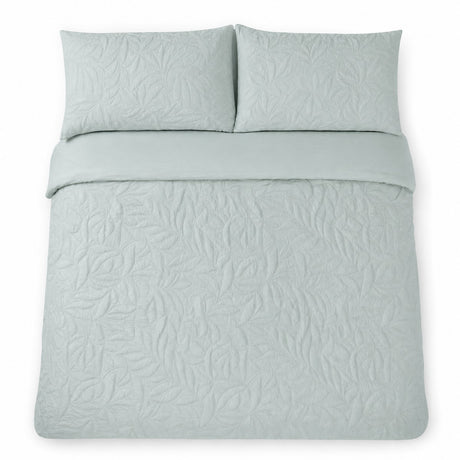 Overhead flat lay of the Luana Green duvet cover set with two matching pillowcases