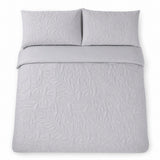 Overhead flat lay of the Luana Silver duvet cover set with two matching pillowcases