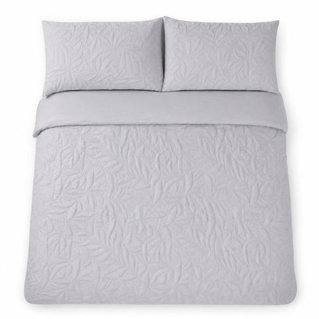 Overhead flat lay of the Luana Silver duvet cover set with two matching pillowcases